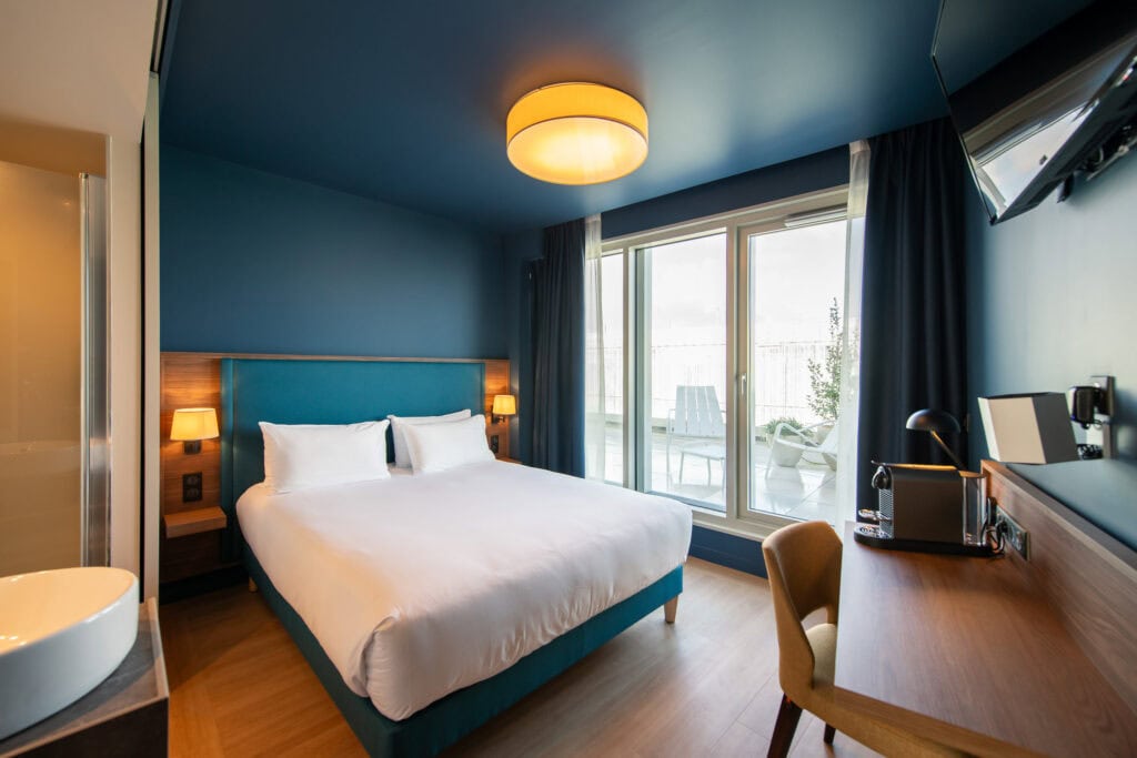 Photo d'une chambre double deluxe à l'Hôtel de la Cité à Nantes.